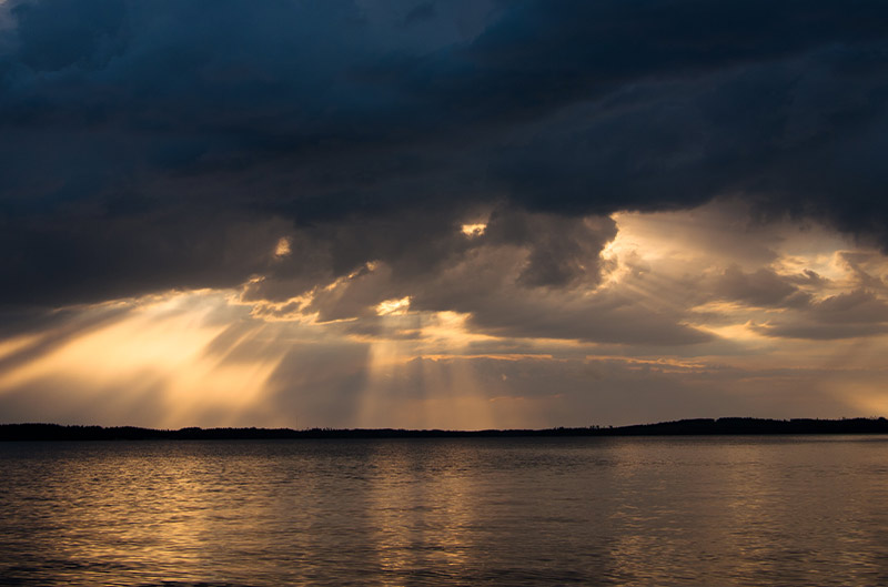 Dark stormy sky above water